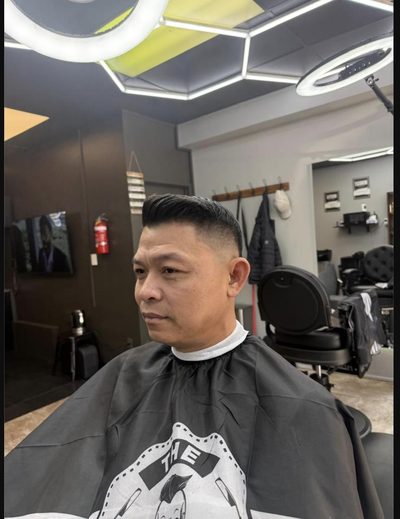 A zero fade styled on top, cut at Fade Shack Barbers in Orewa.